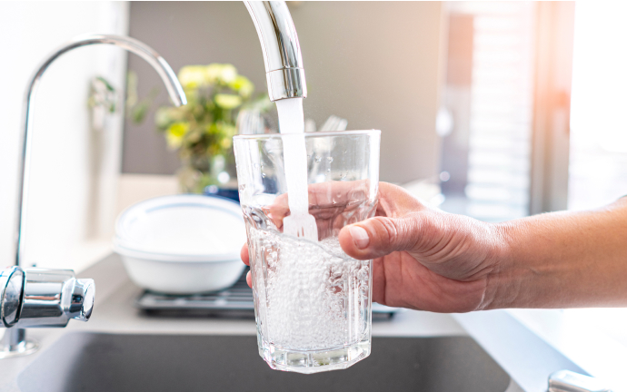 filling a glass with water